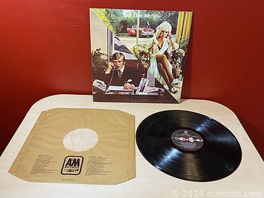 MaxSold Auction: This online auction includes Royal Doulton, Limoges, fishing gear, sports plaque posters, Christmas decor, brassware, ceramics, milk glass, wool blankets, record albums, and much, much more!