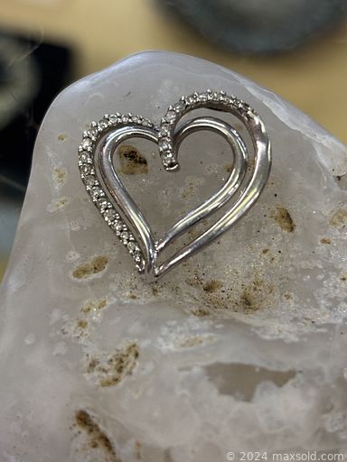 MaxSold Auction: This online auction features Indigenous artwork, Chinese art prints, art posters, antique photographs, soapstone carvings, Mudmen figures, art pottery, pipes, wicker cabinet, snuff bottle, sterling silver jewelry, decanters, art glass, fishing reels, hobnail glass, vintage lighters, watches, comics, coins, and much, much, more!!!