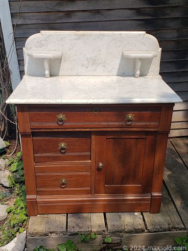 MaxSold Auction: This online auction features fishing tackle, antique tin panels, stained glass, furniture such as antique jam cupboard, oak buffet, maple armoire, and peacock chair, cookware, lamps and much more!