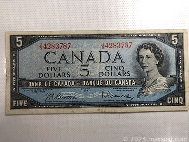 MaxSold Auction: This online auction features tokens, medallions, stamps, Royal\'s collectibles, banknotes, coins, vintage books, silver jewelry, vintage framed pictures, vintage newspapers, vintage viewfinder & slides, and much, much, more!!