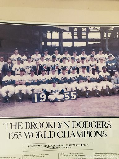 MaxSold Auction: This online auction includes a 1955 Brooklyn Dodgers framed print, Capodimonte tureen, prints, kitchenware, furniture such as rattan and wood nightstands, chinese buffet, dining table, chairs, swinging desk lamp, armoire, sectional couch and more!