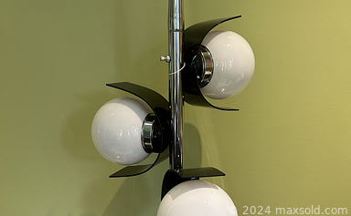 MaxSold Auction: This online auction includes an outdoor umbrella, propane fire pit, vintage tins, wall art, vinyl records, accessories, electronics, tri-light lamp, oak chairs, lamps, Char-Broil BBQ grill, lumber and more!