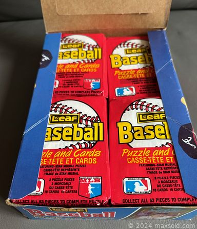 MaxSold Auction: This online auction features sports collectibles, vintage toys, vintage board games, sports trading cards, vinyl records, air hockey table, comics, card-collecting supplies, and much, much, more!!!n