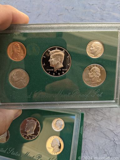 MaxSold Auction: This online auction features framed wall art, Art Nouveau advertising, US proof sets, vintage paper dolls, Star Wars collectibles, vintage tennis racquets, vintage tea set, vintage Hall tea kettle, sports trading cards, vintage cameras, art glass, studio pottery, MCM jewelry, coins and much more!