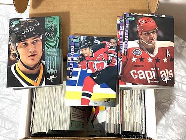 MaxSold Auction: This online auction features Hockey, Baseball, Football cards, mainly from the 70s, 80s and 90s, as well as collectible hockey photos from the 40s and 50s.