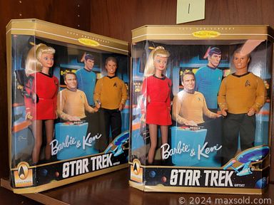 MaxSold Auction: This online auction features Star Trek Barbie, Special Edition Barbies and other Barbie dolls, Barbie clothing, vintage Federalist Ironstone dinnerware, vintage Royal typewriter, Rosenthal Pompadour china, porcelain dolls, costume jewelry, Limoges, Lionel trains, antique Bible, violin, oak dining table, pink glass, vintage books, quilts, antique armchair and much more!