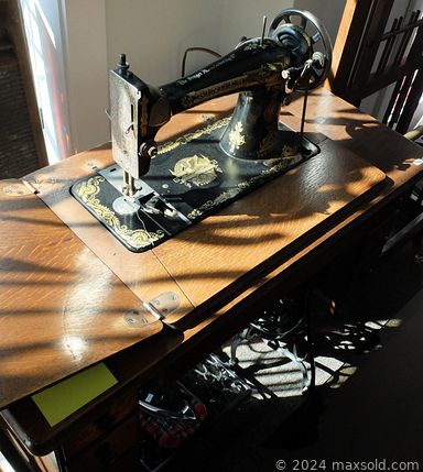 MaxSold Auction: This online auction features display cabinets, sewing machine, fashion  jewelry, world coins, novelty gold flakes, cloisonne items, clay tea set, proof coins, collector spoons, and much, much, more!!