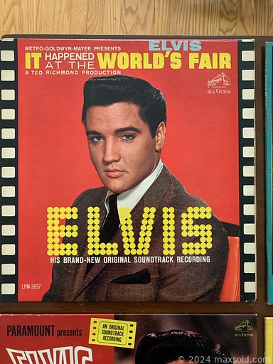 MaxSold Auction: This online auction includes furniture such as an antique school desk, storage cabinets, patio table and chairs, oak side cabinet, TV tables, bedroom set, dresser, coffee table and others, artworks, Elvis memorabilia, jewelry, accessories, vinyl records, books, art supplies, Uranium glass, servingware, Asian ceramics, Spongeware, grandfather clock, lamps, Blue Willow and other china, Tiffany style lamps and much more!