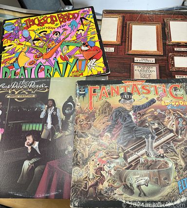 MaxSold Auction: This online auction includes jewelry, accessories, Royal Doulton figurines, Asian decor, Navajo pottery, ceramics, vinyl records, decanters, figurines, comic books, loose gemstones and much more!n