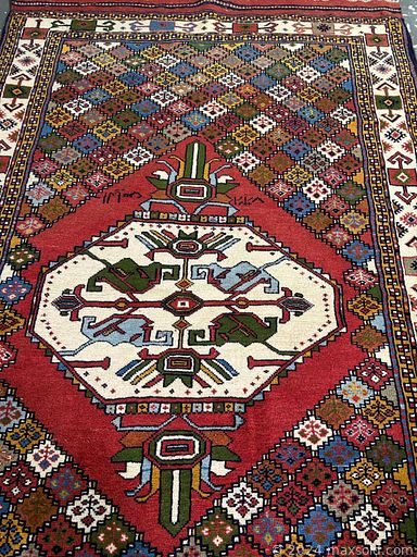 MaxSold Auction: This online auction includes handmade wool rugs from Iran and more!
