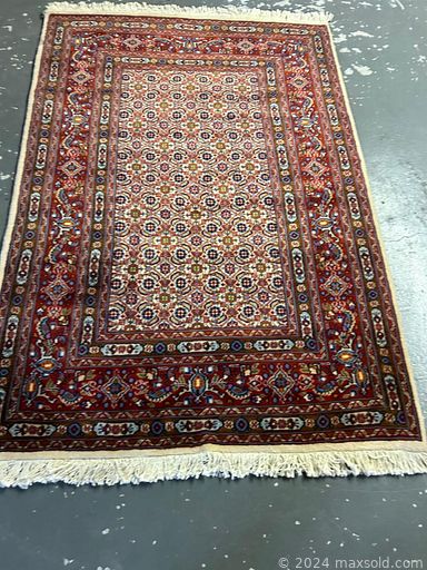 MaxSold Auction: This online auction features Persian wool rugs & runners and more!