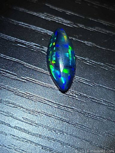 MaxSold Auction: This online auction features loose opals, including jelly, black, rolling flash, honeycomb, fire, Ethiopian, and more!