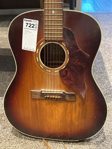 MaxSold Auction: This online auction features guitar, vintage books, Belleek china, stone carving, nesting dolls, video game console & games, art pottery, vintage trunks, ceramic figurines, kimonos, teacup/saucer sets, watch, sofa bed, and much more!