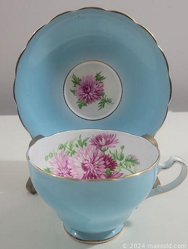 MaxSold Auction: This online auction features vintage fine china, vintage hat pins, new cosmetics, new patio chair cushions, vintage side chair, marquetry table, costume jewelry, glassware, art glass and much more!