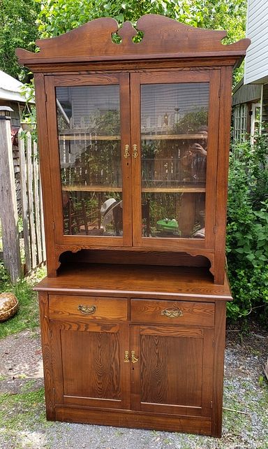 MaxSold Auction: This online auction features antique long case clock, vintage rugs, slag glass lamp, art glass, hand tools, vintage oil lamps, Victorian hall rack, primitive utensils, mountain bike, barware, studio pottery, horse bells, antique oak hutch and much more!