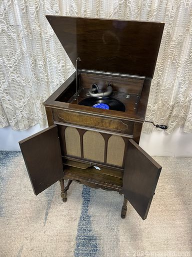 MaxSold Auction: This online auction features commercial refrigerator, vintage glass bottles, Polynesian wooden mask, stereo components, antique phonograph, vinyl records, guitar, Leland Bell prints, stained glass window & light, thermometer collection, video games, sports collectibles, sports trading cards, small kitchen appliances, vintage tricycles, NIB light fixture, grow light bulbs, comics, DVDs, stamps, Pokemon cards, amps, fitness gear, hand tools, garden tools, and more!