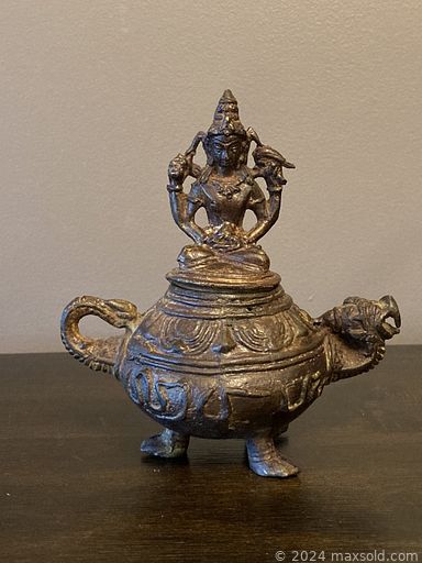 MaxSold Auction: This online auction features vintage puppet, sterling silver jewelry, vintage oil lamps, costume jewelry, uranium glass, silver coin, horse brass, art glass, watches, gold jewelry, antique insulators and much more!