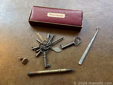 MaxSold Auction: This online auction includes antique sterling silver, servingware, kitchenware, antique china, small kitchen appliances, vases, wall decor, marbles, oil lamp, light fixtures, Bissell vacuum, vintage Mattel dolls, vintage jewelry, vinyl records, linens, Samsung TV, Italian figurines, furniture such as antique pine chairs, desk chairs, waterfall style cabinet, cupboard, storage unit, blanket box and much more!