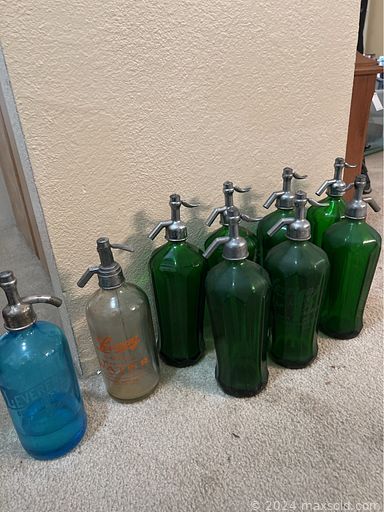 MaxSold Auction: This online auction features collectible cottages, TV, flatware, pet products, small kitchen appliances, glass insulators, globe bar, home health aids, grandfather clock, office supplies, sewing machine, lingerie dresser, antique seltzer bottles, oil lamps, and much more!!