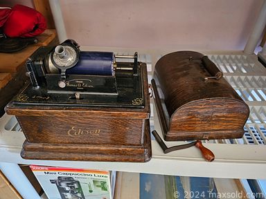 MaxSold Auction: This online auction includes furniture such as an antique desk, oakwood chair, rolltop desk, cabinet, tables, bedframe, chairs and others, wall art, lamps, antique mantle clocks, radio components, vinyl records, oil lantern, Mega Bloks and other toys, tools, hardware, gramophone, record player and other electronics, skim boards, golf clubs, Selma china, kitchenware, small kitchen appliances, camping gear, yard tools, garden decor, seasonal decor, fishing supplies, crystalware, cleaning supplies, painted figures, magic trick equipment, antique accordion, clown figures, Coca Cola memorabilia and many more!