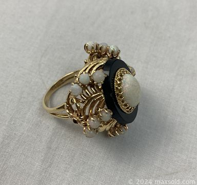 MaxSold Auction: This online auction includes antique gold and pearl jewelry, original oil paintings, early Chinese pottery, Barbie collectibles, art glass, Belleek pottery, furniture such ed carved dining chairs, vintage tea cart, teak coffee table, antique love seat, Royal Doulton china, Birks sterling silver, lamps, antique lead figures and much more!