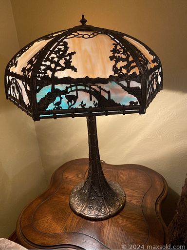 MaxSold Auction: This online auction features antique slag glass lamp, glass oil lamps, art pottery, display plates, costume jewelry, beverage fridge, art glass, stoneware jugs, desks, office supplies, vintage wood dresser, metal scroll bed frame, leather furniture, exercise equipment, TVs, BBQ grill, patio furniture, garden statues, live plants, yard tools, men’s coats, power & hand tools, antique metal grates, printers, vinyl records, area rugs, small kitchen appliances, Art Deco stained glass, and much more!