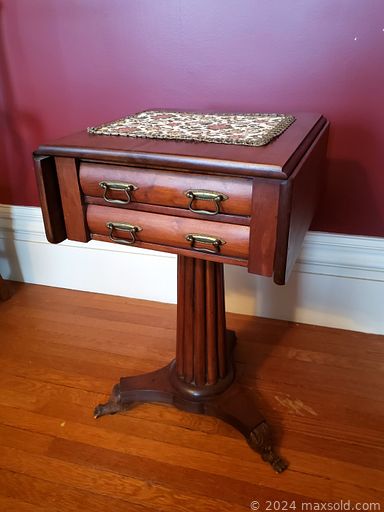 MaxSold Auction: This online auction features furniture such as a glass showcase, floral armchairs, vintage glass front cabinet, midcentury table, sideboard chest, vintage stool, slant top desk, media cabinet, wood dining chairs, antique dining table and others, rugs, lamps, Waterbury mantle clock, vintage hall mirror, paintings and wall art, standing fans, vintage video camera, whiteboards, Bozo the Clown coat hanger, fireplace tools, Casio cash register, books, decor and much more!