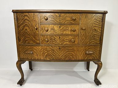 MaxSold Auction: This online auction features Philippino war shield, vintage upholstery fabric, Japanese pencil etching, lithographs, MCM chrome lounge chairs, comic art illustrations, antique Tiger Oak server, coins, writing desk, settee, and much, much, more!!