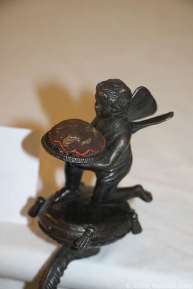 MaxSold Auction: This online auction includes furniture such as Lutheran church pews, shelving units, bookshelves, cabinets, cast iron pin cushion, oriental rug, Swarovski crystals, GI joe, LOL dolls and other toys, vintage Lladro, Deuter indoor stationary bike trainer, books, vinyl records, DVDs, pocket tools, stamps, accessories, jewelry, kitchenware, Nintendo Wii, hoverboard, Pro Flash strobe, Majolica ware, cast iron thread holder and much more!