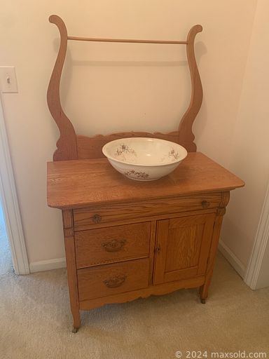 MaxSold Auction: This online auction features nesting table, Victorian chair, oil lamp, armoire, cedar chest, Roseville pottery, trunk, hutch, MCM furniture, Fenton art glass, stoneware dishes, MCM Kings Crown Ruby thumbprint glass, Godinger plates, Noritake china, upholstered armchair, candlestick, baking lot, kitchen lot, flatware, depression glass, amber glass, books, kitchen appliances, rug, vacuum, jewelry, end table, cast iron figurine, linens, CDs, vintage child’s tea set, Limoges salt & pepper, wooden & ceramic bowls, Waterford crystal, thermometer, metal fire safe, bookcase, coffee maker, decoys, antique doll buggy, signed oil painting, games, signed drawing, singer sewing machine, bench vise, tools, comics, African art, TV, blankets, patio, bird feeders and much more!