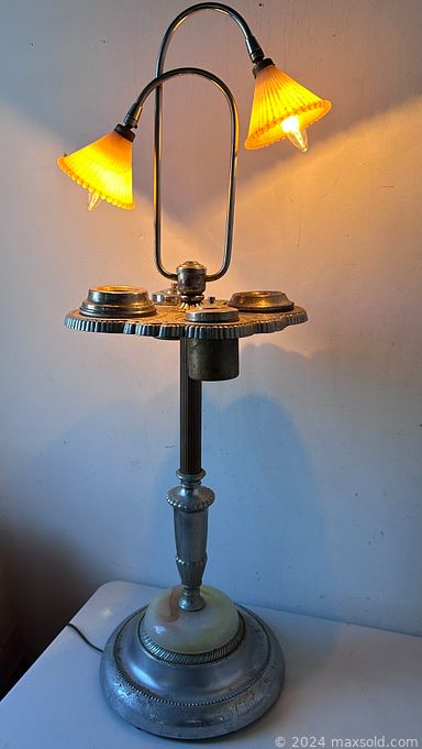 MaxSold Auction: This auction features Lamps, Original Paintings, Tea Cups, Decanters, Stained Glass, Figurines, Coke Cooler, MCM Glass, Chess Set, Wall Decor, Coin Shape Bank, Uranium Glass Bowl, Vintage Phone, Cocktail Shakers, Christmas Ornaments, Head Planter, Molson Pub Sign and much much more!