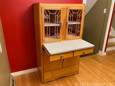 MaxSold Auction: This online auction features vintage kitchen appliances, Noritake teapot, art pottery, vintage porcelain pub handles, perfume bottles, decanters, cookie jars, vintage playset, antique pink glass, Bunnykins, wood carvings, vintage chicken nesting dishes, vintage Pyrex, turtle lamp, vintage jewely, vanity mirror, vintage inlay table, Hoosier kitchen cupboard, steamer trunk, and much, much, more!!