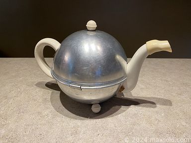 MaxSold Auction: This online auction includes Coca Cola memorabilia, Noritake and other china, servingware, Asian decor, jewelry, accessories, vintage ephemera, books, trading cards, vintage buttons, lamps, pottery, vintage Lefton and Napco figures, movie posters and other wall art, chessboard and other games, vintage camera, ViewMaster, musical piano bar, vintage typewriter, bar stool, Chrome Furniture Co. chairs, folding tables, Howard Miller clock, valet stand, display shelves and many more!