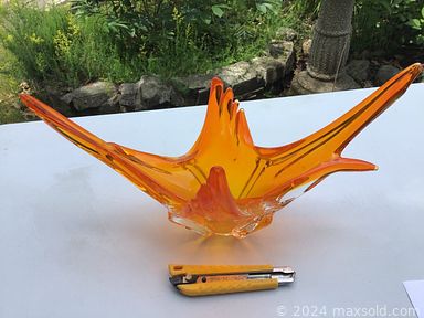 MaxSold Auction: This online auction features Denmark vintage pottery, German porcelain, etched crystal, vintage tea service, Holkham pottery, Staffordshire, stone carvings, Batman, Kiss and other comics, antique milk glass, sculptures and much more!