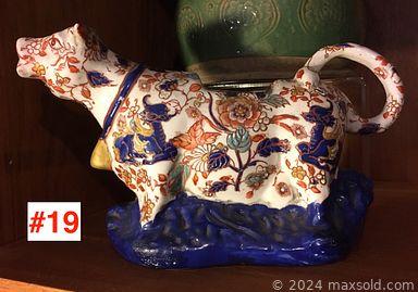 MaxSold Auction: This online auction features a Thonet bentwood rocking chair, high chair, MCM lamp, antique cranberry glass, porcelain pots, cut crystal, Asian stoneware, figural pitchers, Maastricht transferware, antique Chinese pedestal, vintage lamp, antique lute, brass items, demitasse sets, oil lamps, jewelry, antique postcards, pins, vintage paper money, electronics and much more!