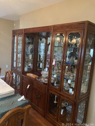 MaxSold Auction: This online auction features furniture such as a storage cabinet, tiered wood table, china hutch, side tables, sofa, chairs, Bradington leatherette sofa and more, lamps, kitchenware, media, decor, Lenox dinnerware, Barwick grandfather clock, seasonal decor, wall art, Goebel figures and much more!