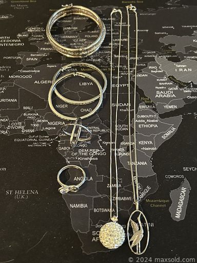 MaxSold Auction: This online auction includes collectibles such as sports trading cards, US and Canadian currency, diecast vehicles, and collectible plates, Lego, hardcover books, sterling silver jewelry, home decor, Wii console with games, and more!