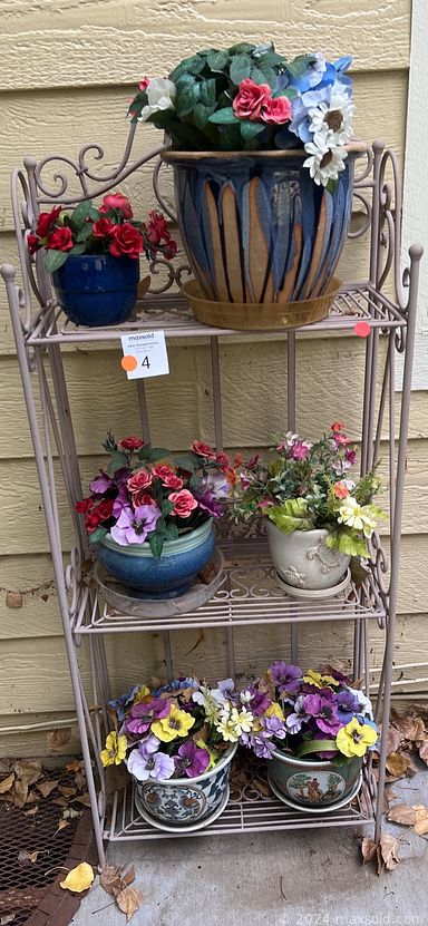 MaxSold Auction: This online auction includes framed artwork, collector plates, furniture such as patio table with chairs, drop leaf cart, expanding breakfast table with chairs, corner desk, dressers, recliners, and Queen Anne highboy, planters, Hoover vacuum, 1920s lamp, 39” Samsung TV, and much more!