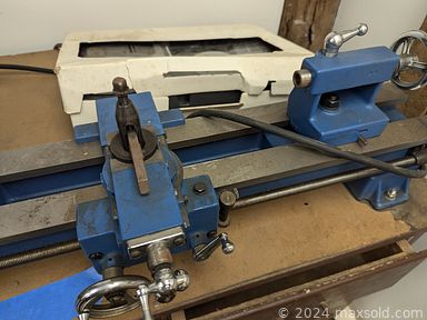 MaxSold Auction: This online auction features sewing machine, power & hand tools, hardware, painting supplies, vintage bottles, steins, art glass, yard tools, workbench, stainless steel counter, and  much more!!!