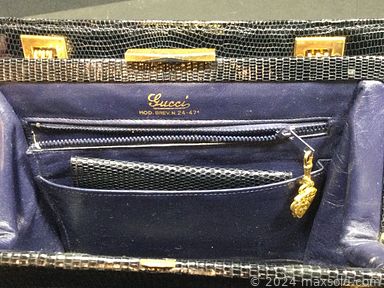 MaxSold Auction: This online auction includes original art such as watercolors, oil on canvas, mixed media, and etchings, Gucci purse, fountain pens, dinnerware, antique Venetian desk, antique settee, vintage teak credenza, vintage rugs, and more!