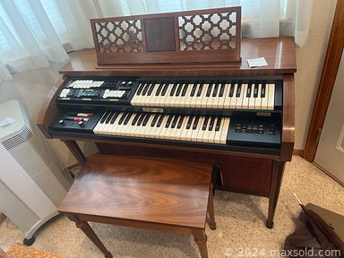 MaxSold Auction: This online auction includes Baldwin organ, Native American artwork, collectible cars and motorcycles, furniture such as side tables, rocker recliners, coffee table, wooden table with chairs, couches, bookshelves and entertainment cabinet, books, clothing, kitchenware, DVDs, office supplies, Raleigh bicycles, holiday decor, crafting supplies, and much more!