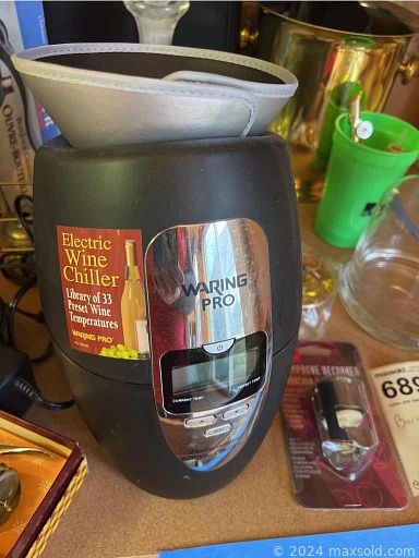 MaxSold Auction: This online auction features entertainment center, hutch, wine rack table, lenox collection, flatware, stemware, kitchen appliances such as food processor, toaster oven, blender, tools, workbench and much more!