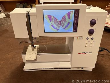 MaxSold Auction: This online auction includes a Bernina 1080 Special sewing machine, Durand pleater, table loom with standing base, Bernina Artista 200, quits, Elna serger, knitting and sewing supplies, cutting table, Janome 3160 QDC and more!