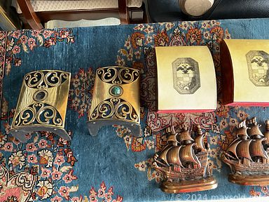 MaxSold Auction: This online auction features vintage bottles, coins, clay wall mask, Indigenous art, painting supplies, small kitchen appliances, Hoselton sculpture, binoculars, vintage Nike shoes, tires, costume jewelry, watches, woodblock prints, autoclave, TV, laptops, brass collectibles, area rugs, art glass, perfume bottles, and more!