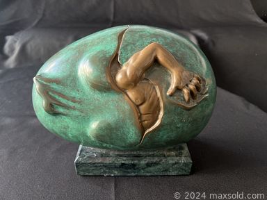 MaxSold Auction: This online auction includes a sideboard, hall bench, office chair, vintage foo dogs, sculptures, comic books, wall art, Paris decor, Z Gallerie mirror, coins, decanters, china and more!