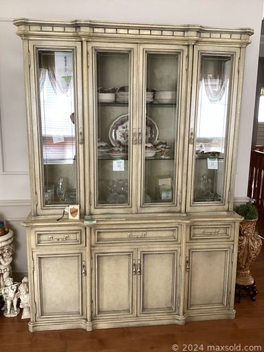 MaxSold Auction: This online auction features MCM roll-top chest, Lladro figurines, antique Ironstone dishes, office supplies, rooster collection, decorative plates, coffee table books, Hummels, rattan furniture, sewing machine, stained glass lamp, area rugs, printer, computer desk, oil lamp, antique ink well, yard tools, and much, much, more!!