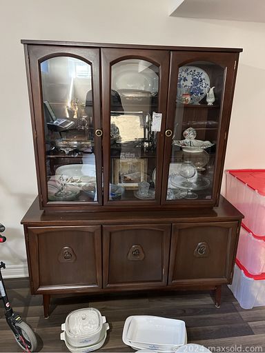 MaxSold Auction: This online auction includes furniture such as china cabinets, sectional sofa, MCM dining table and chairs, storage cabinets, shelving units, bench, bed frames, demilune table, desk, stools and others, planters, garden tools, art supplies, stamps, coins, books, silverplate, Murano glass, blue glass, silverplate, pewter items, Aynsley, Mayfair, Paragon and other china, kitchenware, small kitchen appliances, carvings, rugs, clothing, shoes, accessories, linens, sewing machine, wall art, mobility aids, toys, electronics, large jugs and many more!