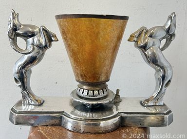 MaxSold Auction: This online auction features carved jade sculpture, art glass, Art Deco table lamp, electric guitar, wood carvings, novel teapot, MCM table lamp, West German pottery, snuff jar, antique signal lantern, wood carved tribal mask, Toby mug, vintage enameled art, and much, much, more!!!