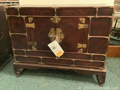 MaxSold Auction: This online auction features Tansu chests, Ames Aire chairs, toys, Sunka game boards, carvings, African masks, art pottery, vintage desk, barware, rugs, primitive drum, blanket chest, Square Rigger model ship, sewing side table, miniature decorative table screen, vintage textiles and much more!