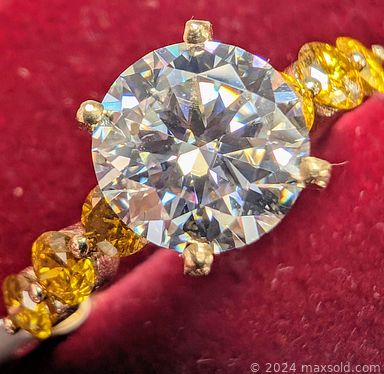 MaxSold Auction: This online auction includes Diamond rings, Opal and Diamond pendants, Emerald earrings, chains, necklaces, pearls and other jewelry, loose gemstones, coins and many more!